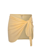 Butter yellow ribbed wrap around skirt with a white background